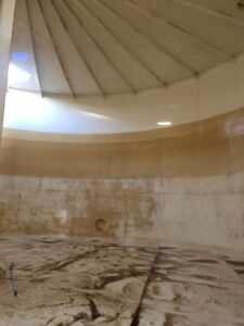 large water tank is filthy before being cleaned Blue Earth Products The Science of Safe Water